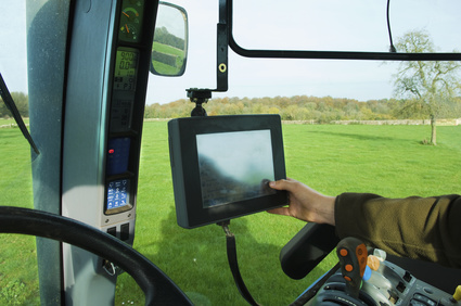 Touch screen used in agricultural vehicle